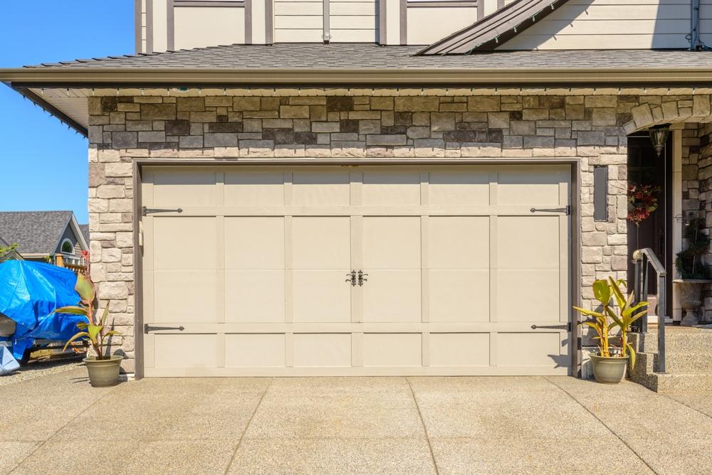 Why Your Garage Door Is Not Opening in the Heat (And How to Fix It)